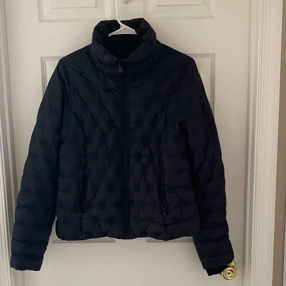 The North Face Black Women's Puffer Jacket.